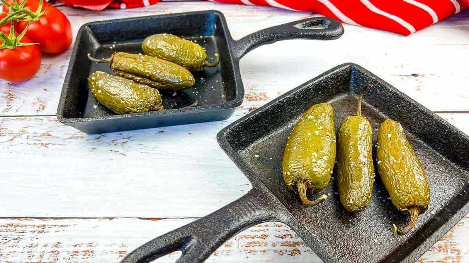 Smoked Jalapenos in 2 cast iron pans.