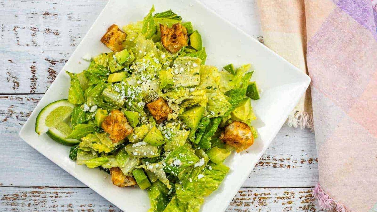 An image of Tex-Mex Caesar Salad on a square plate.