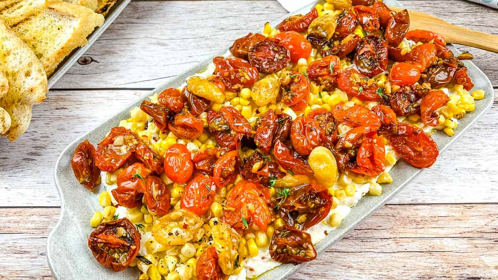 Tomato bruschetta board on a table.