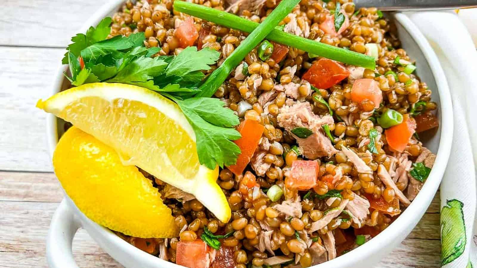 Wheat Berry Salad with Tomato & Tuna in a bowl.