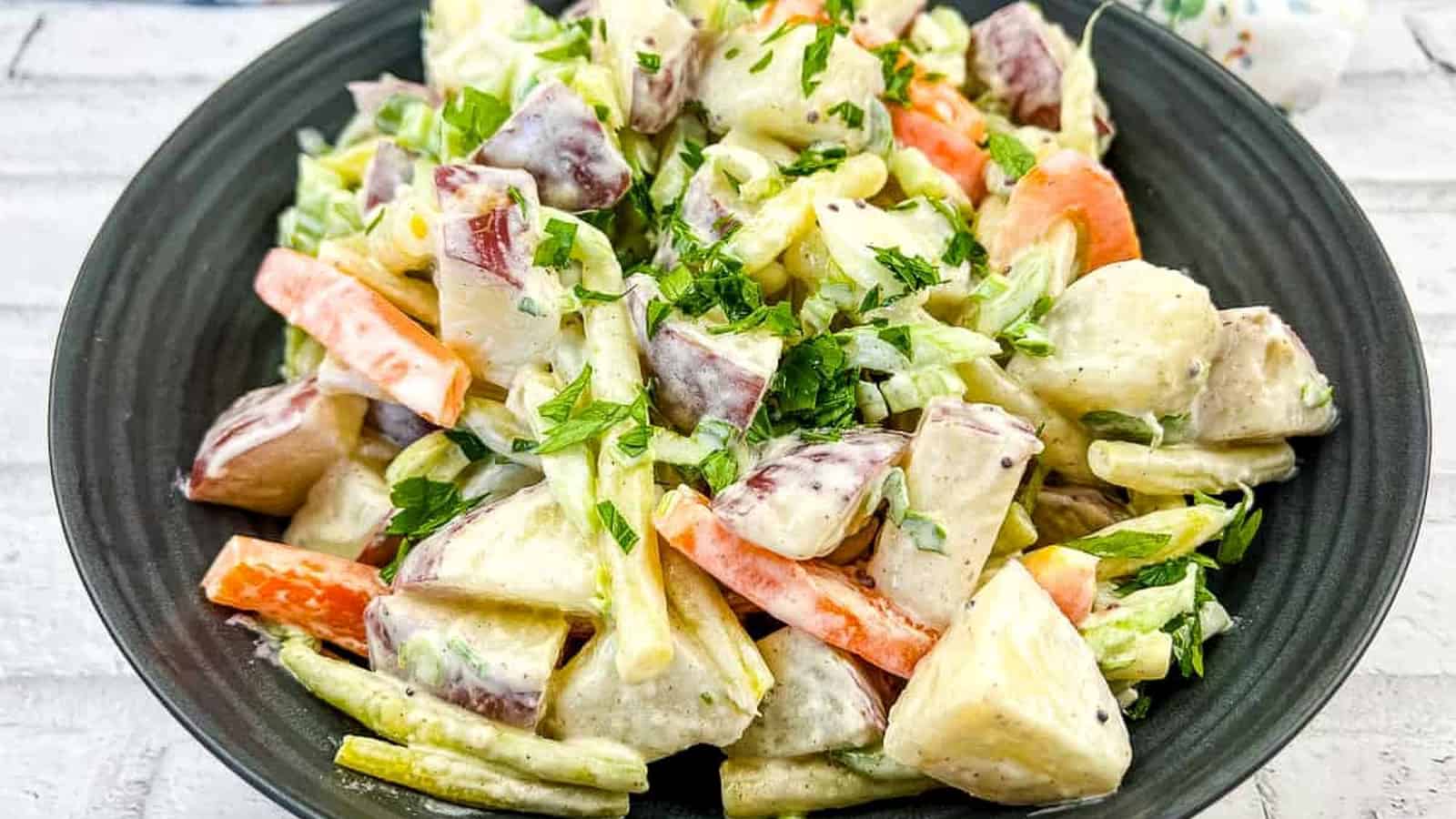 A bowl of yellow bean and potato salad.