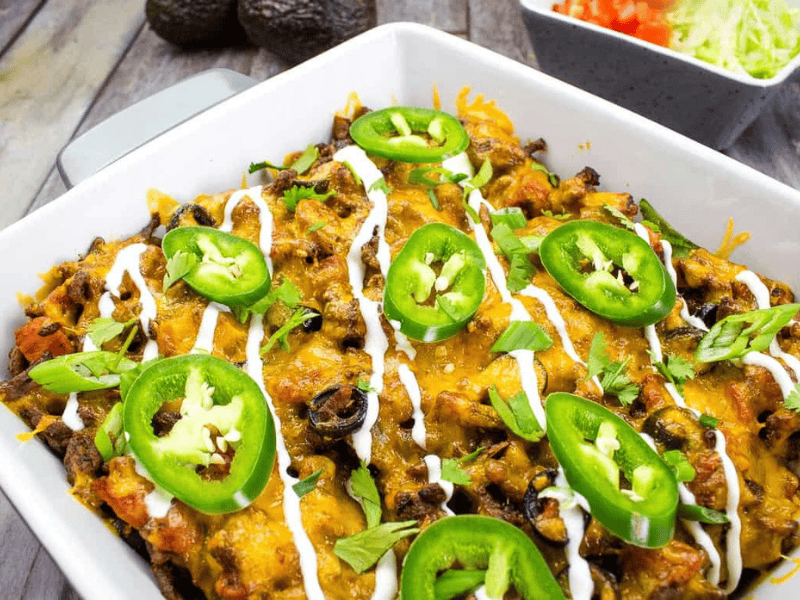 A Taco Casserole dish with black beans, cheese and jalapenos.