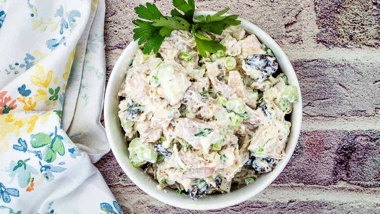 Chicken Salad with Walnuts and Cranberries in a bowl.