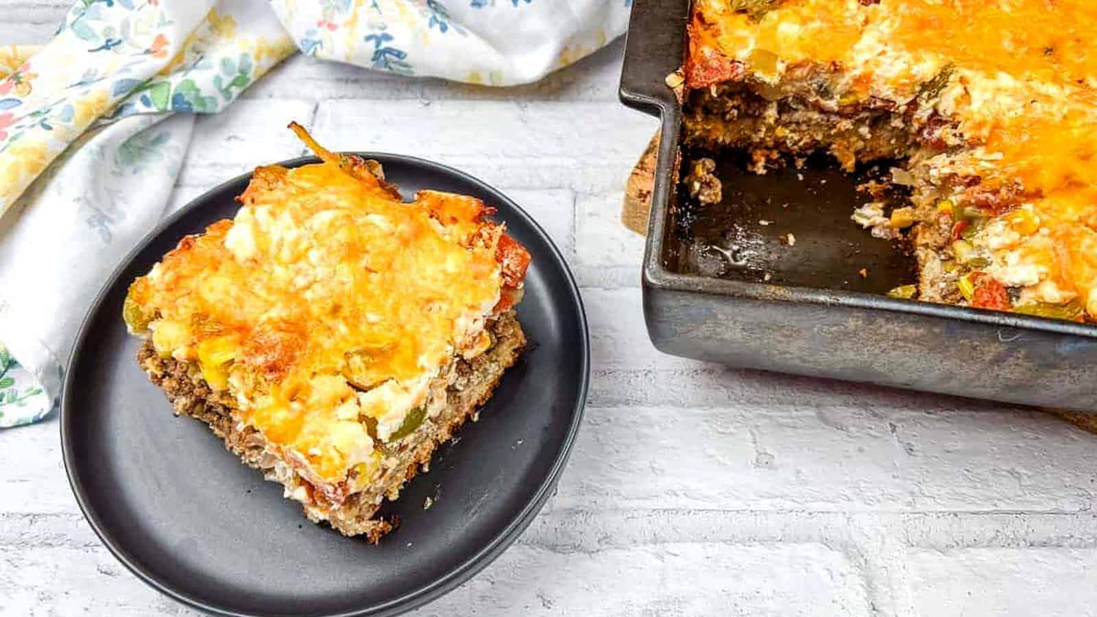 A slice of beefy John Wayne casserole on a plate.