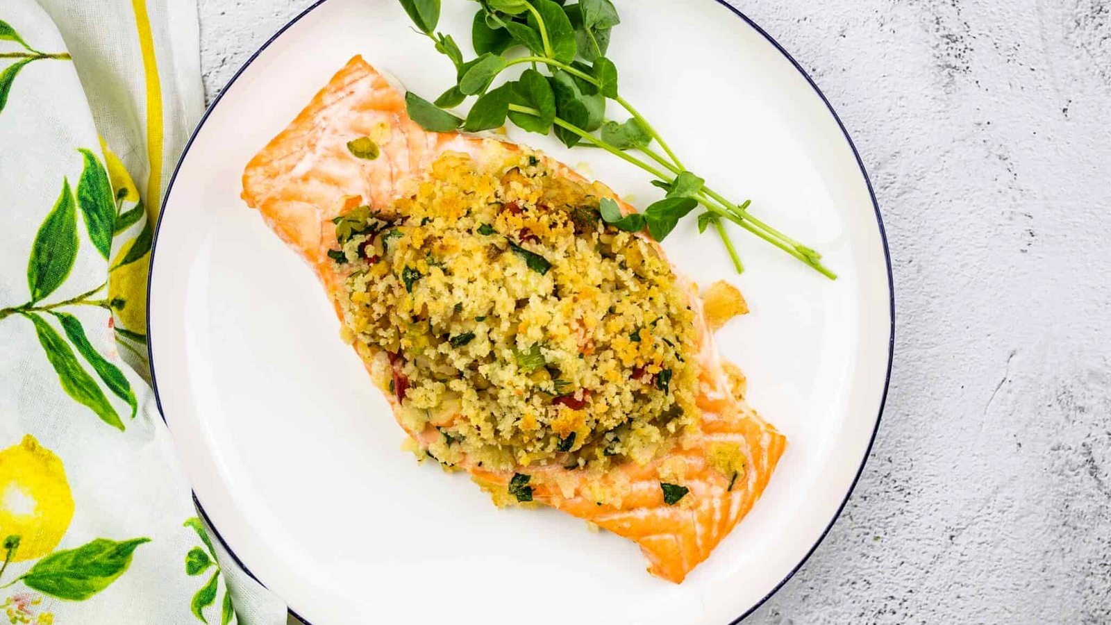 Seafood Stuffed Salmon on a circular white plate.