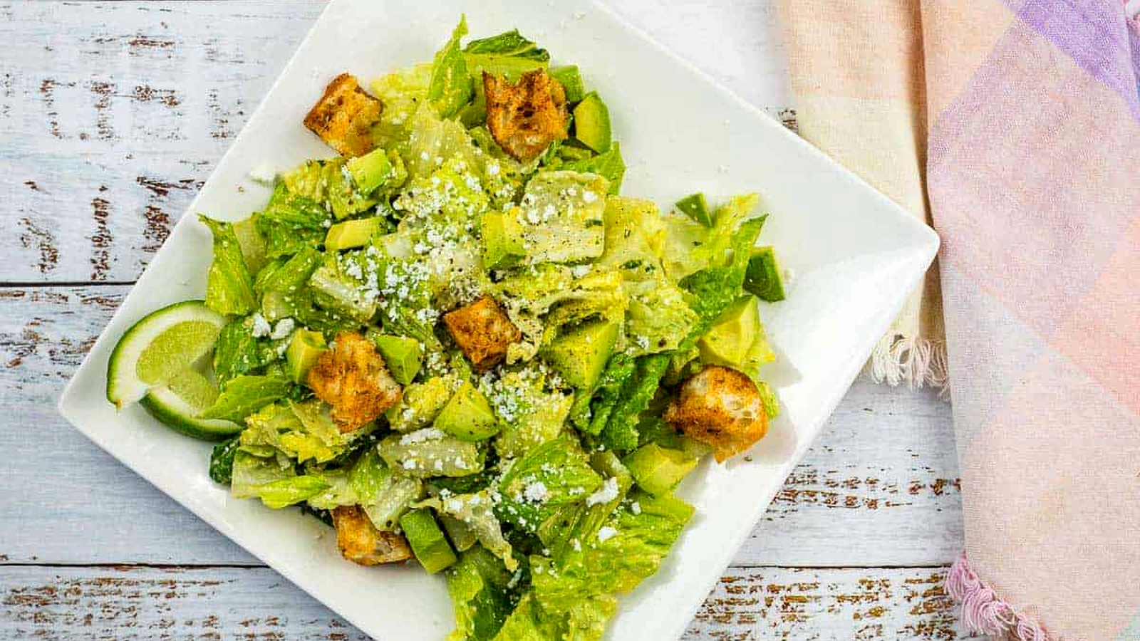 An image of Tex-Mex Caesar Salad on a square plate.