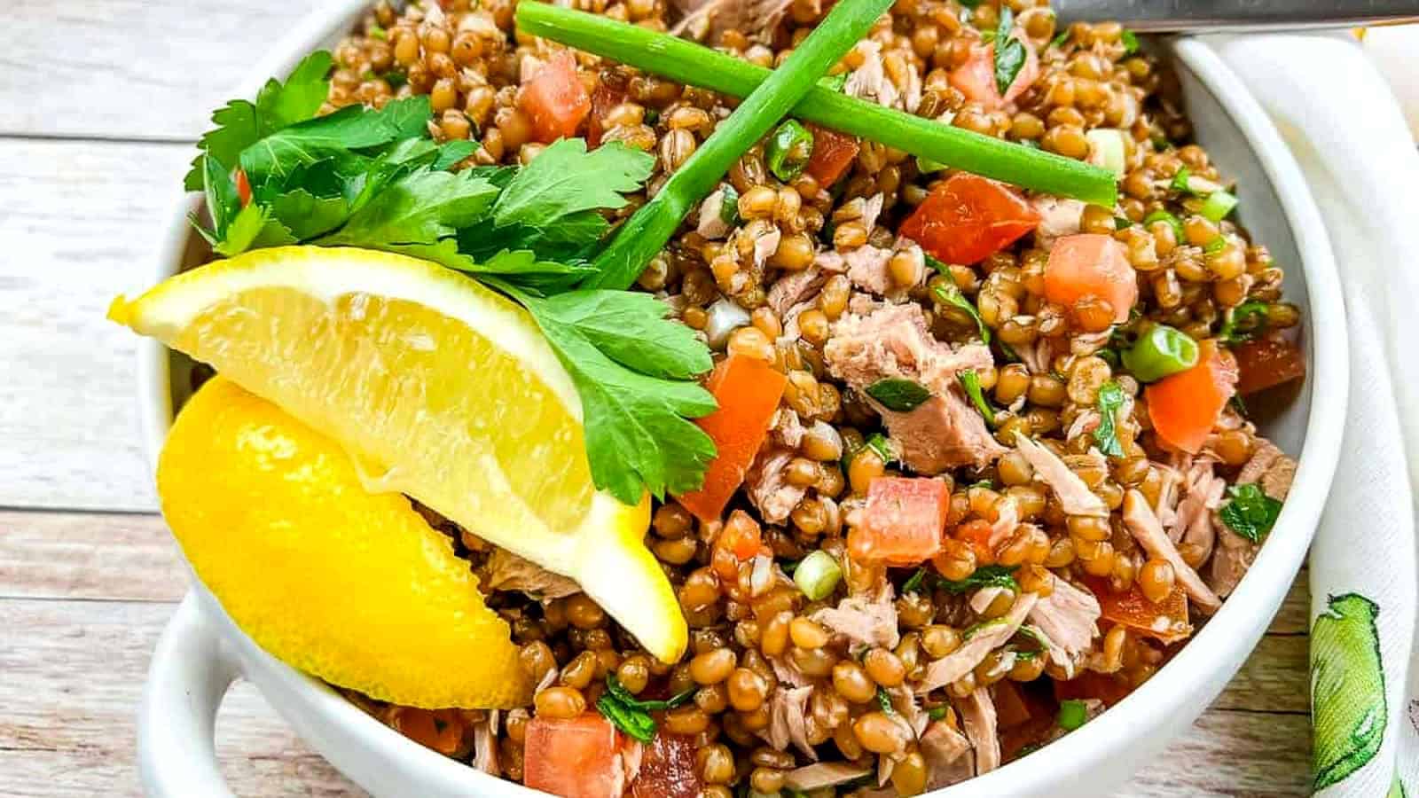 Wheat Berry Salad with Tomato & Tuna in a bowl.
