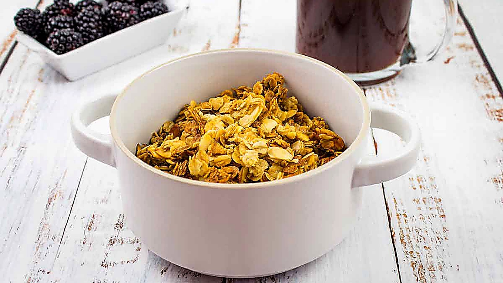 Honey Almond Granola in a white bowl.