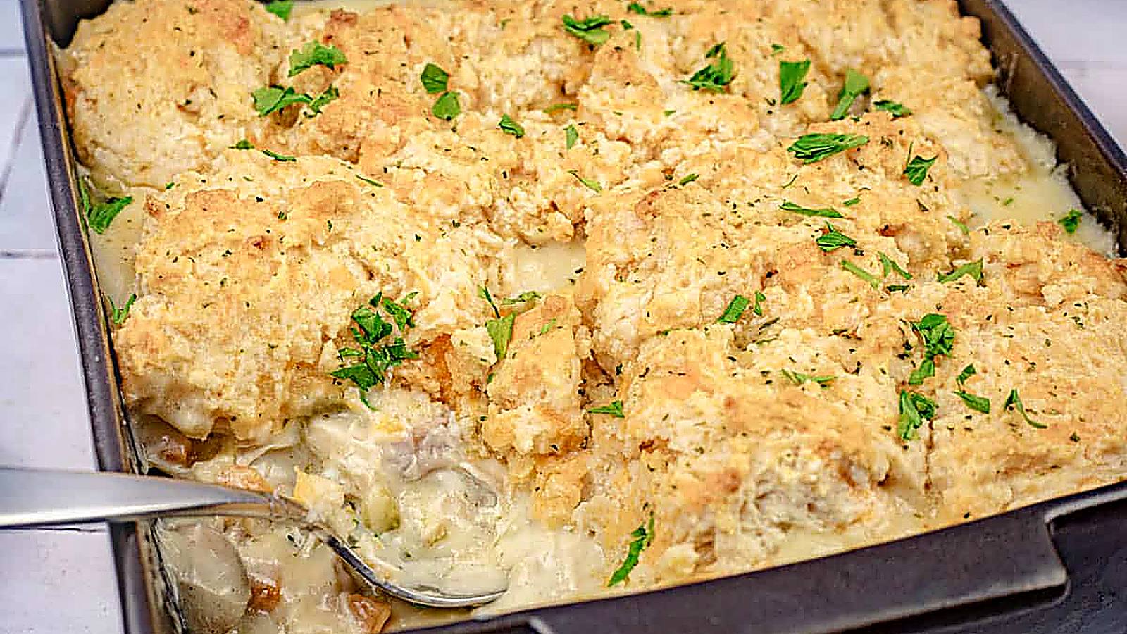 A casserole dish of Chicken Cobbler with Red Lobster Biscuit.