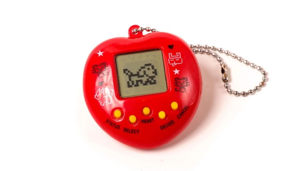 A red, heart-shaped digital pet keychain with a small screen displaying a pixelated animal and four yellow buttons&mdash;this nostalgic toy fad is sure to top any kid&rsquo;s wish list.