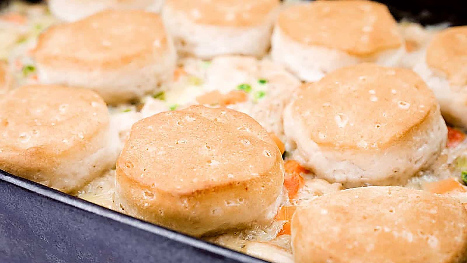 A baking dish filled with Biscuit-Topped Chicken Pot Pie.