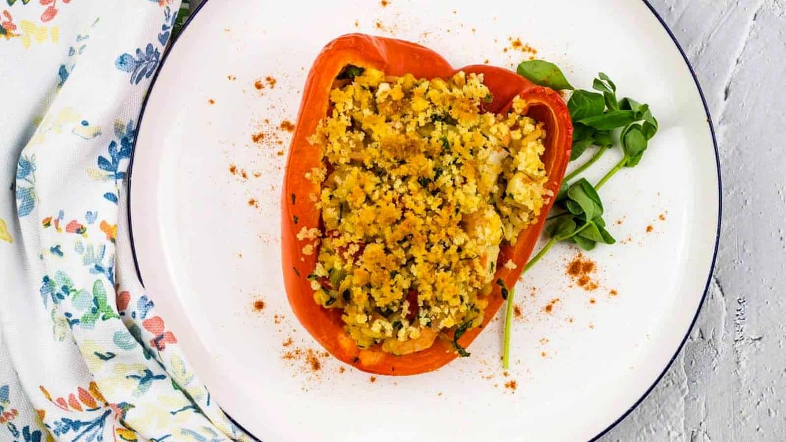 Seafood Stuffed Bell Peppers on a white plate.