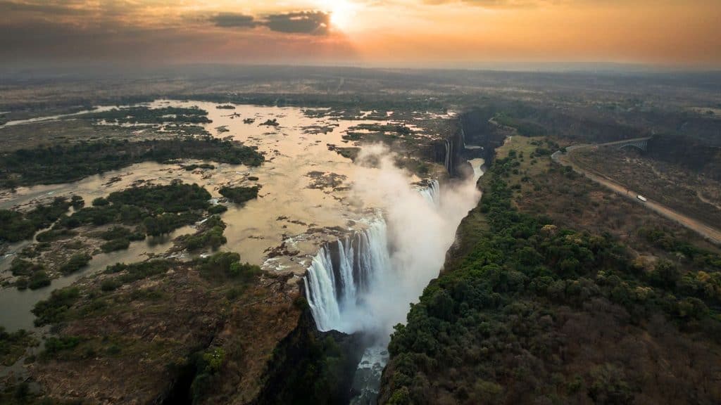 Aerial view of Victoria Falls at sunset.