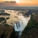 Aerial view of Victoria Falls at sunset.